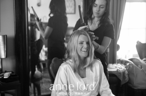 Bride's hair fixing by hairstylist | Anne Lord Photography